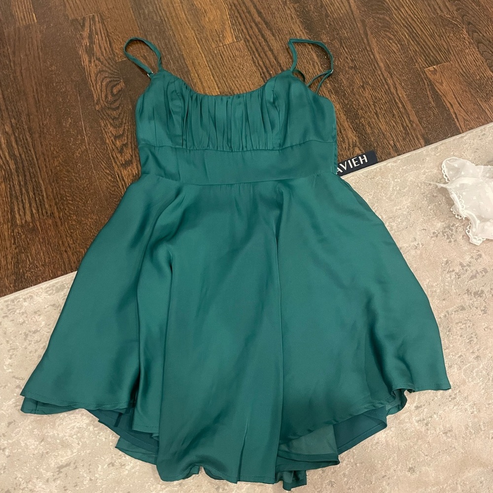 This is a green mini dress from Selfie Leslie. It is a size small.